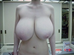 boobgrowth:  And that was the last growth update she posted on her blog, back in 2001. Rumor has it, she’s still alive and well… her tits having grown so enormous that she is immobile.