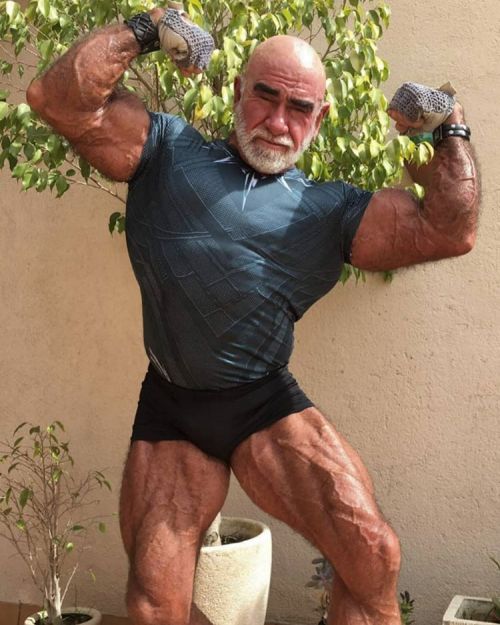 Studly muscle daddy, Jose, ‘models’ his assorted ‘muscle tops’.&nb