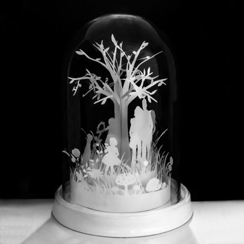 This paper sculpture is made by Sarah Waghorn. It sits under a glass cloche and she can personalise 