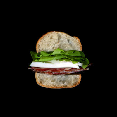 Soppressata, mozzarella, arugula on a baguette