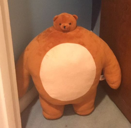 stuffed bear big body small head