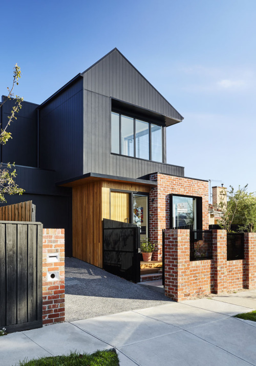 remodelproj:Nice use of materials of home exterior - drastic black wood siding juxtapose to natural 