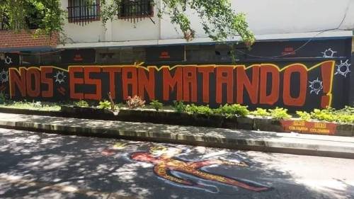 “Nos estan matando / They are killing us” More than 80 graffiti artists came together in