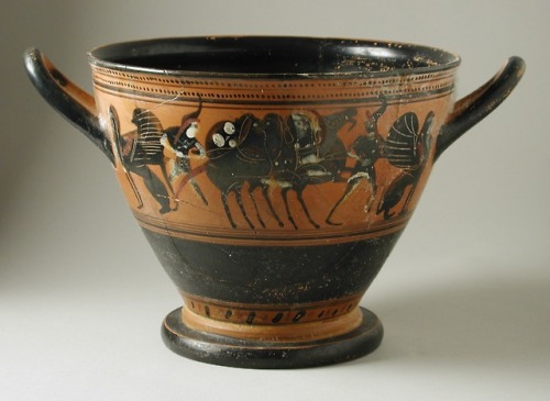 Attic black-figure skyphos (two-handled wine-cup), decorated with chariots, Amazons, and Sphinxes.  