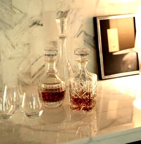 Midcentury Home Bar A Mid-sized Wet Bar Design From The 1950s With A Single-wall, Medium-tone Wood Floor,
