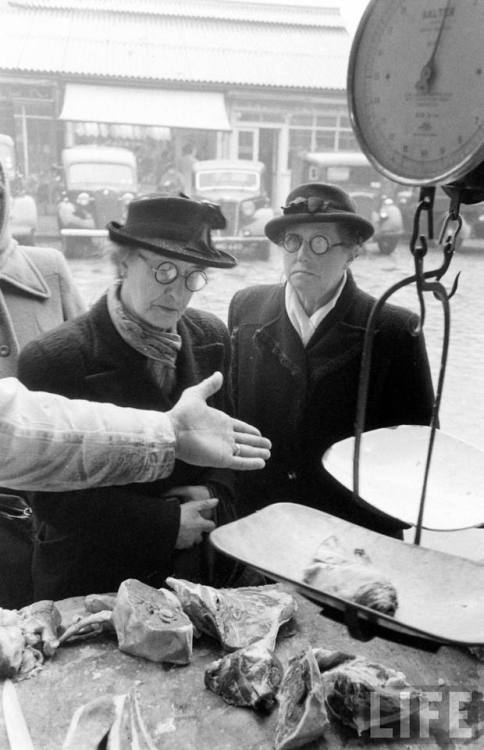 Weighing meat(Cornell Capa. 1951)