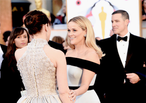 Felicity Jones and Reese Witherspoon attends the 87th Annual Academy Awards