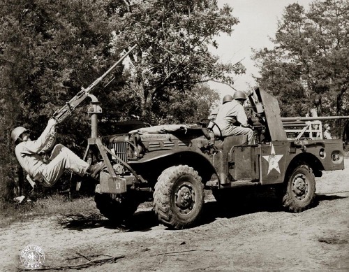 thestunningsurvivalist:peashooter85:World War II jeep with Browning .50 cal. machine gun set up in a