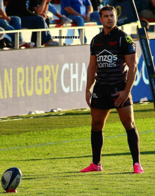 Hot rugby player in tight tri nike socks ready to score.
