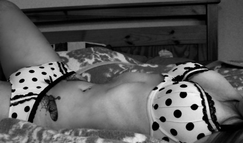Neeve in high contrast polka dots on her adult photos