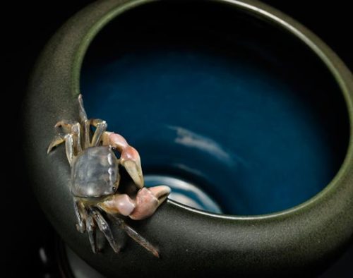 Meiji Era pottery master Makuzu Kozan (1842-1916) captured life-like motifs of crabs on his vases.