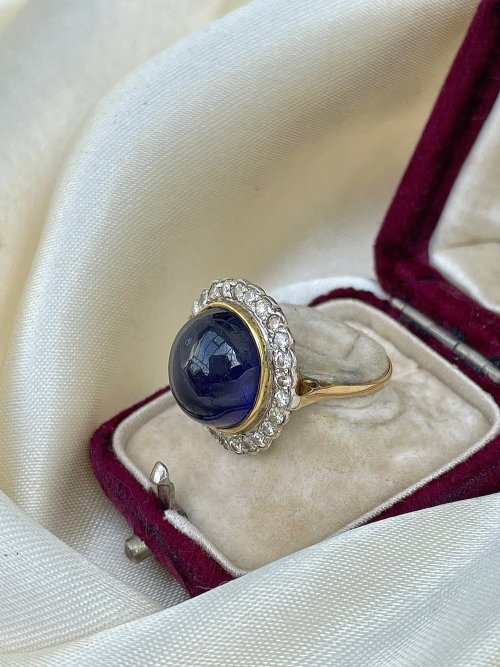 allaboutrings: Vintage 18k Gold Sapphire Cabochon and Diamond Halo Ring