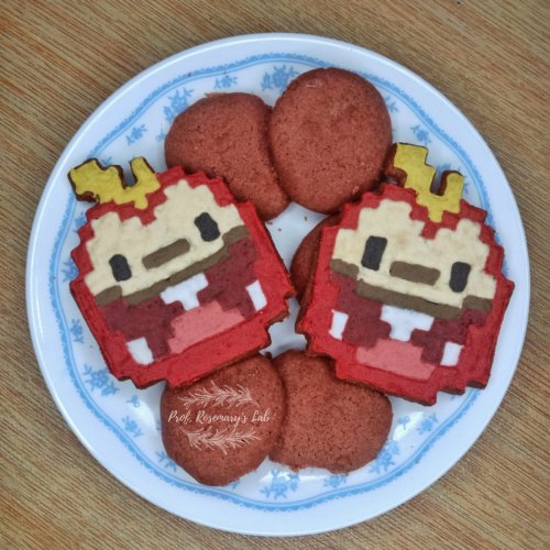 Sprigatito, Fuecoco, Quaxly, and Geodude pixel art cookies by Prof. Rosemary!