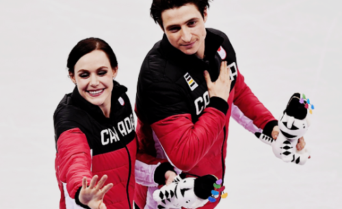 olympicsdaily:team canada celebrates winning olympic gold in team event