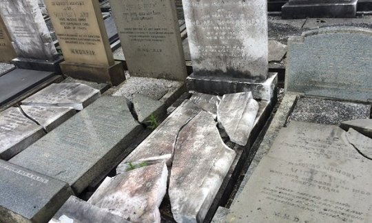 Headstones smashed in 'sickening antisemitic act' at Jewish cemetery