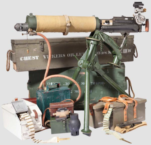 Australian production World War II Vickers machine gun with tripod and accessories.