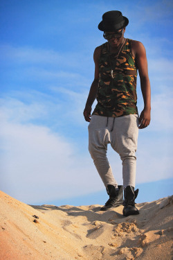 blackfashion:  Othniel Hart, Camo Tank Top, Slacks, 3D glasses, Porkpie Hat &amp; Boots casualest Lookothnielo.tumblr.com 