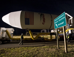 crookedindifference:  Orbital-1 Mission Preps for Launch    An Orbital Science Corporation Antares rocket is seen on Tuesday, Dec. 16, 2013 as it is rolled out to launch Pad-0A at NASA’s Wallops Flight Facility in Wallops Island, VA. The Antares is