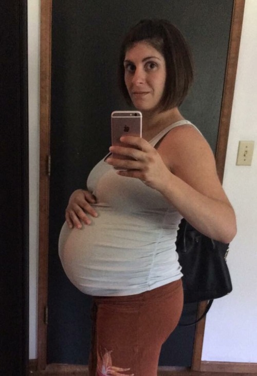 Sexy mommy with an amazing baby bump