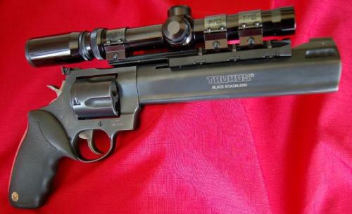 gunrunnerhell:  Taurus Raging Bull 454 A large revolver chambered in the .454 Casull, very potent and effective for hunting. The finish is the rather uncommon matte black; usually Raging Bulls are a matte stainless steel or blued. Note that under the