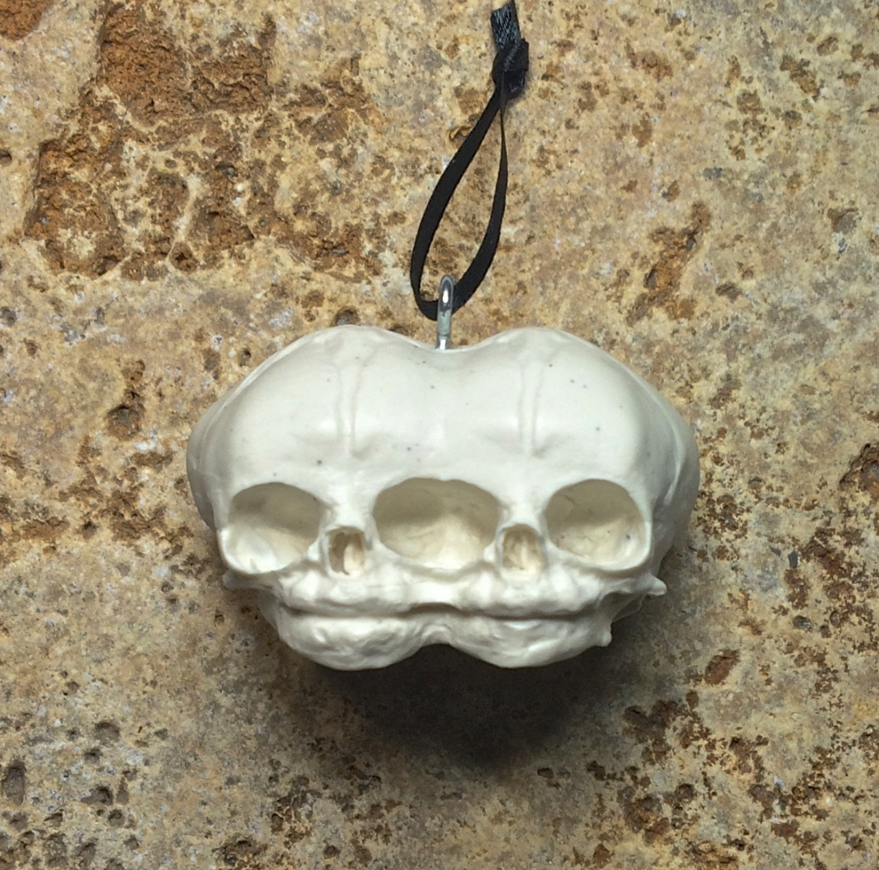 michaeldellamorte:  Conjoined Twins and Werewolf Fetal Skull Ornaments, by Dellamorte