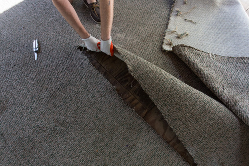 We renovated the porch floor in June. It was covered in decades-old outdoor carpet, but had an intac