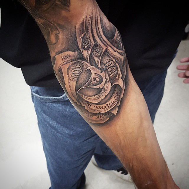 Black Ink Money Rose Tattoo On Right Upper Wrist