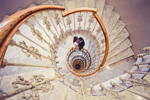 cubebreaker:  These spiral staircase photographs show how design styles differ both by historical era and cultural location. 