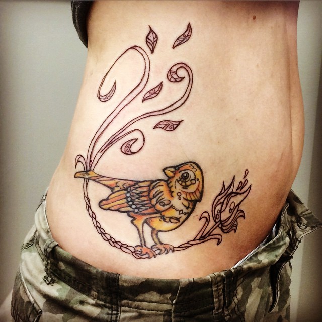 Female body with bird tattoo, closeup Stock Photo - Alamy