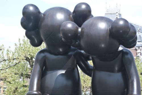 supersonicart:   KAWS in Amsterdam. KAWS recently put up three new sculptures in Amsterdam as part of this year’s ArtZuid 2015.  These sculptures are titled “Along the Way,” (The two figures standing together), “At This Time,” (The lone statue