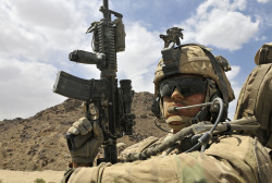 militaryarmament:  An infantryman with 1st Battalion, 17th Infantry Regiment, 2nd Infantry Division, provides security from the rear hatch of his Stryker vehicle during Operation Buffalo Thunder II in the district of Shorabak, Afghanistan, June 30, 2012. 
