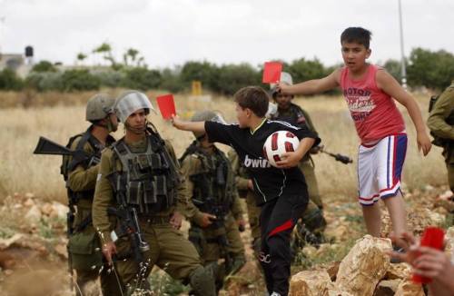 ahmadkhader:    RED CARD, get out of my country.Viva Palestina  