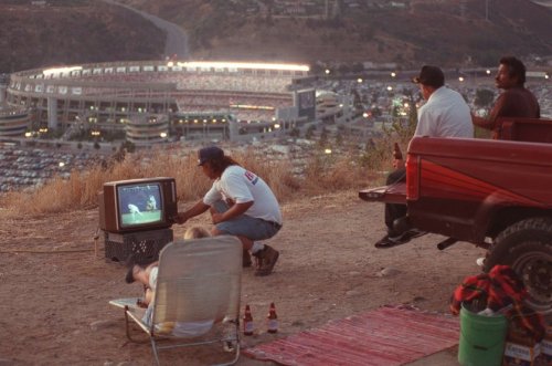historicaltimes: Four spectators watch the MLB All-Star Game on a TV set from a hill above Jack Murp