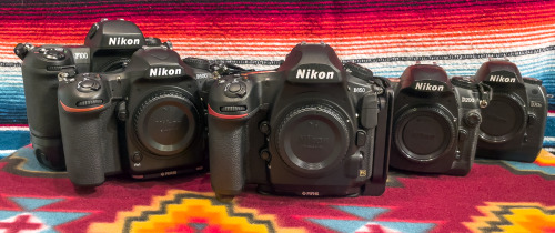 Family PortraitFive generations of my Nikon cameras.The story behind them is under the cut&helli