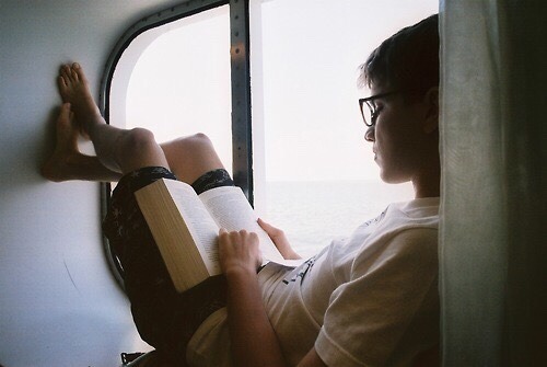 Remus Lupin reading, according to him, the best book in existence. -taken by Dorcas Meadowes, fall 1