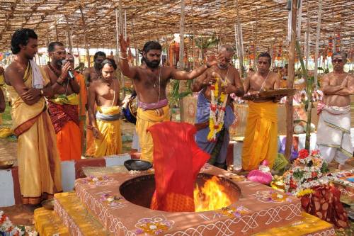 Ritual worship and yagna for the Gods (Vishnu in His form of Salagrama, Shiva as a lingam)