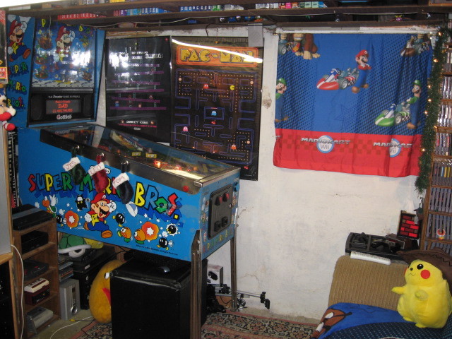 toploaderleo:  This is my game room. I have a pretty good sized collection for a