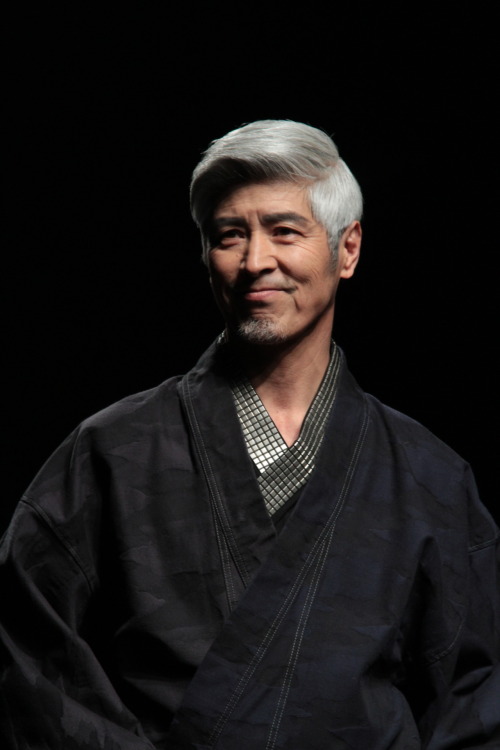 ellensama:My favorite silver fox Japanese runway model is back in another round of amazing designs by Jotaro Saito. Looking even more handsome and always smiling among a sea of serious and frowning models. I still don’t know his name and it kills me!