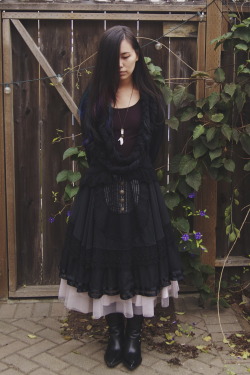 alicedollhouse:  tides of glass, return to ash apron skirt &amp; sweater - h.Naoto GRAMMdoll hand necklace, underskirt - offbranddada donuts boots - fluevog 