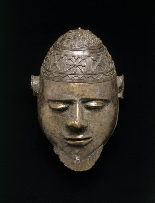 Metal mask of a male face, made by the Nigeria-born Yoruba artist Ali Amonikoyi.  Thought to have be