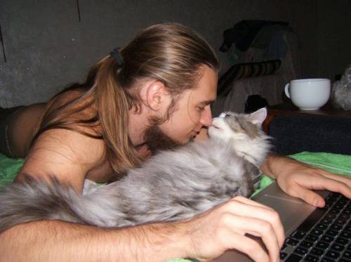 catsbeaversandducks:  “All you need is love… and a cat.” Photos via Real Men Love Cats