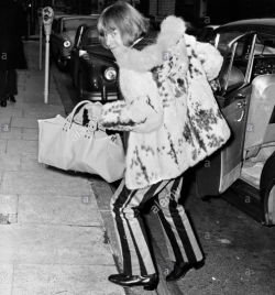 bellbottoms:  chelsea-boots:just wanted to bring this cartoonishly villainous snap of brian jones back to everyone’s attention. context given by alamy stock photo: “brian jones of the rolling stones sneaks into the london harley street nursing home