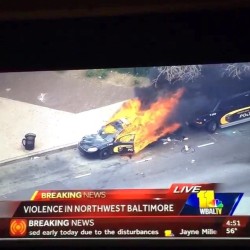 whitegirlsaintshit:  telvi1:  Protesters be safe man.  #prayforbaltimore #baltimore #Freddiegray  They have been showing the same fucking car on loop for hours on end. That same car. That’s the only thing we’ve seen on TV, along with the damn CVS.