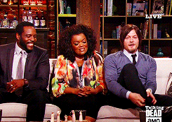 thewalkinggifs:  Norman Reedus showing off his socks on Talking Dead (*by request)
