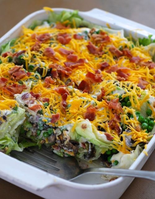 foodfamilyfood:  Layered salad in a cake pan: 1 head iceberg lettuce; ¼ cup chopped purple onion; ½ cup chopped celery; ½ cup chopped green pepper; ½ cup chopped fresh mushrooms; 12 oz. package frozen peas thawed; 2 cups real