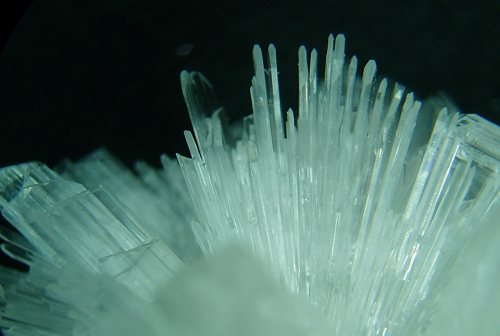 rockon-ro:  HEMIMORPHITE crystals from the Ojuela Mine, Mapimi, Durango, Mexico. Photo shows a cluster of transparent, terminated hemimorphite crystal taken with a microscope at 15X magnification. 