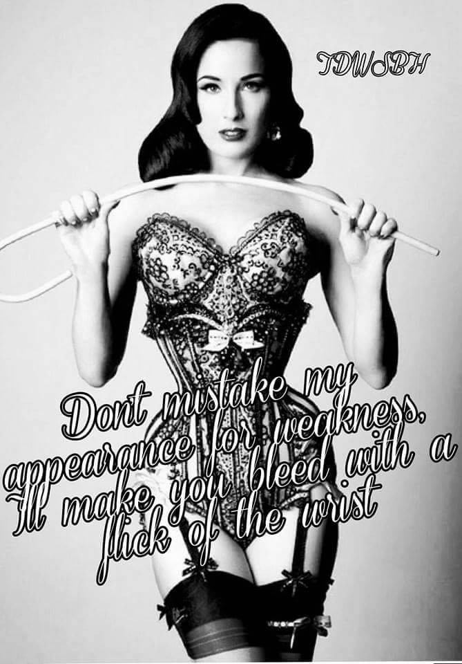 The Dom Who Stands Behind Her