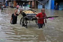 Heavy monsoon rains over India and Burma. Even