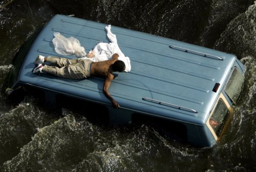 revolutionarykoolaid:  huffingtonpost:  These Are The Forgotten Images Of Hurricane Katrina When Hurricane Katrina pounded the Gulf Coast in 2005, photojournalists captured things nobody ever thought they’d see in a major U.S. city: homes submerged,