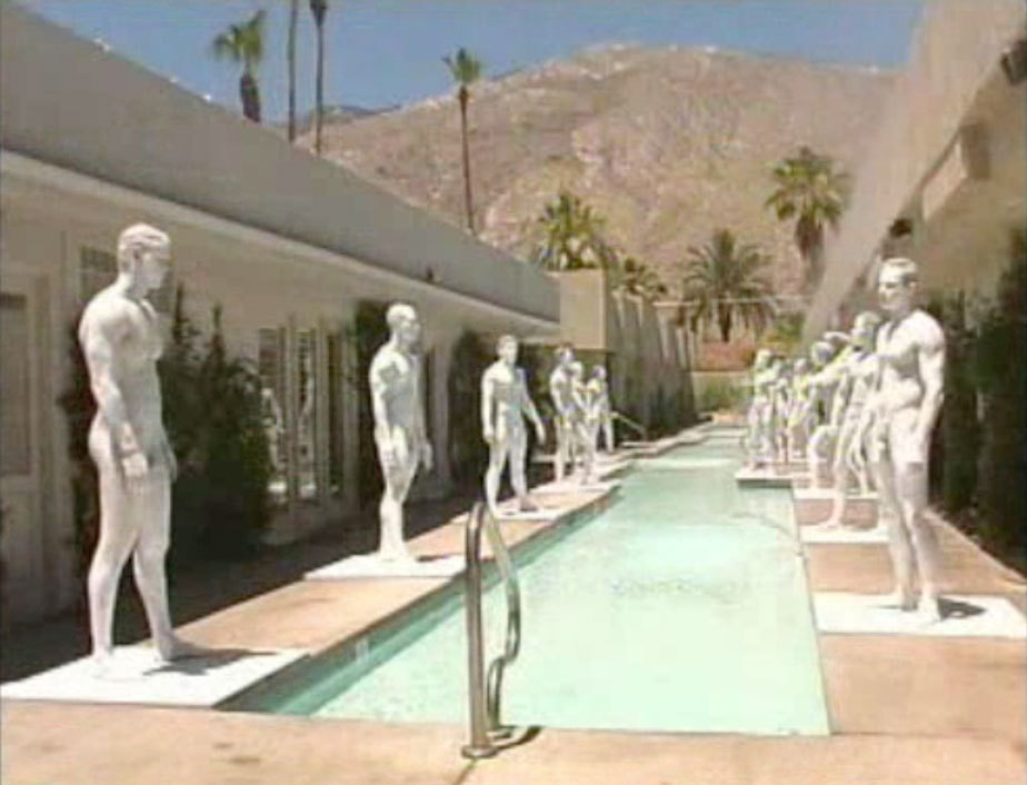 Former guests, now turned to stone, serve as decorative nude statues along the length